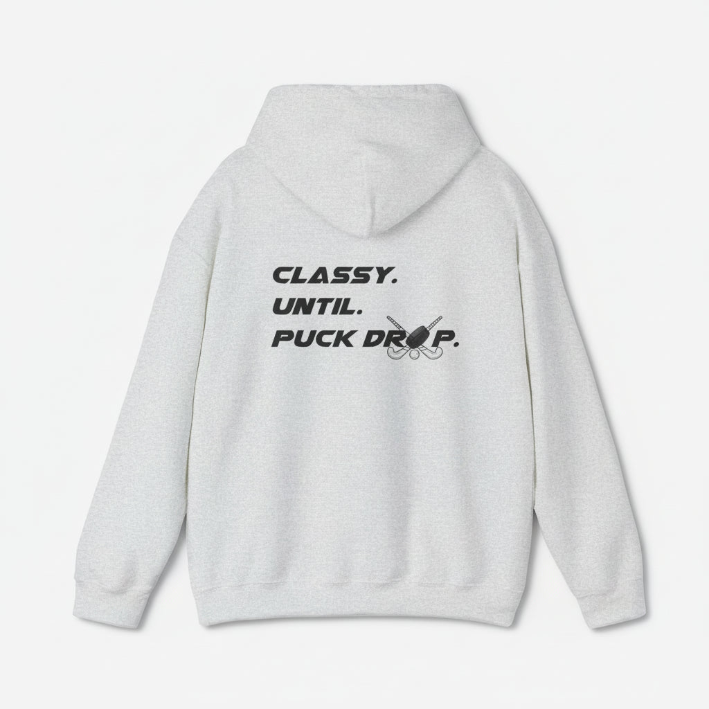 Gray hoodie with text 'Classy. Until. Puck Drop.' on the back against a white background