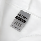 Gildan label on a white shirt